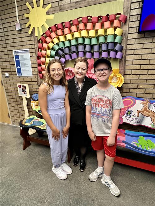 students give interim superintendent Dr. Jeanice Swift a school tour at Deerfield